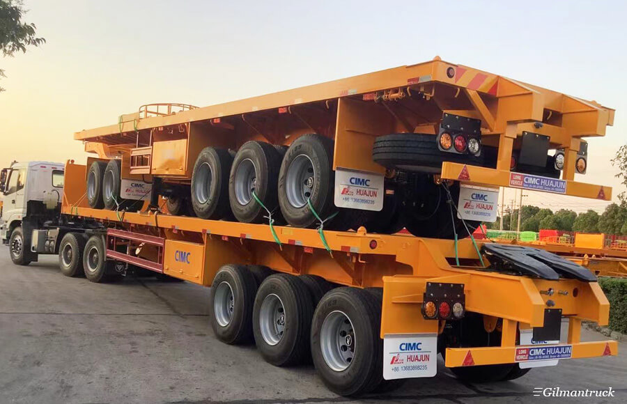 Flatbed double trailer train customized for coal transportation in Mongolia.